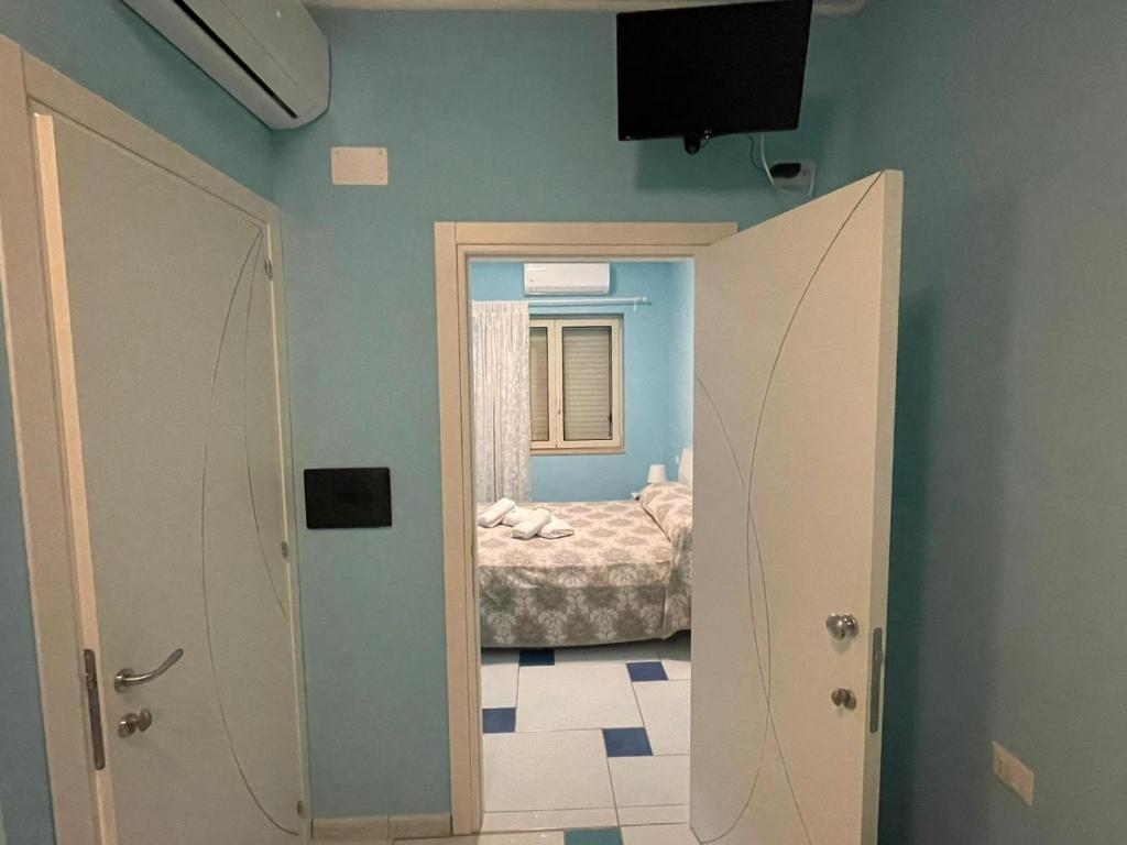 Postel nebo postele na pokoji v ubytování B&B El Dorado