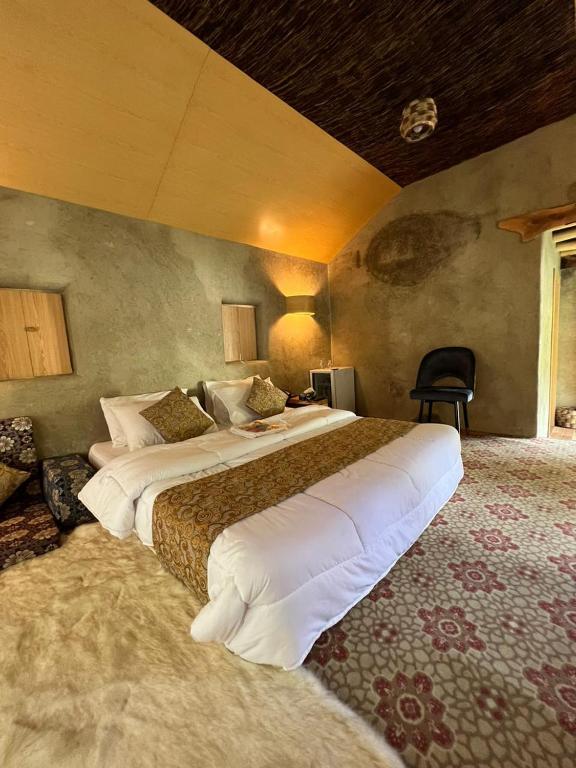 Postel nebo postele na pokoji v ubytování Safari Resort Skardu