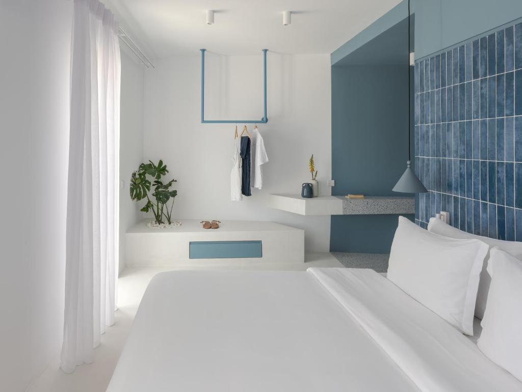 Postel nebo postele na pokoji v ubytování Aegean Colors Paros