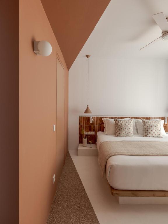 Postel nebo postele na pokoji v ubytování Aegean Colors Paros