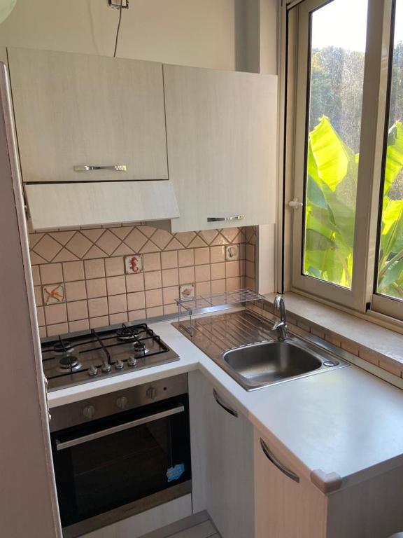 Kuchyň nebo kuchyňský kout v ubytování B&B El Dorado