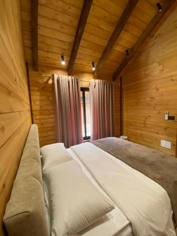 Postel nebo postele na pokoji v ubytování Agora Farmhouse