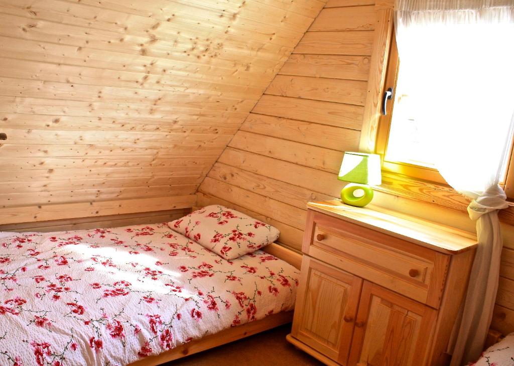 Postel nebo postele na pokoji v ubytování Ranczo