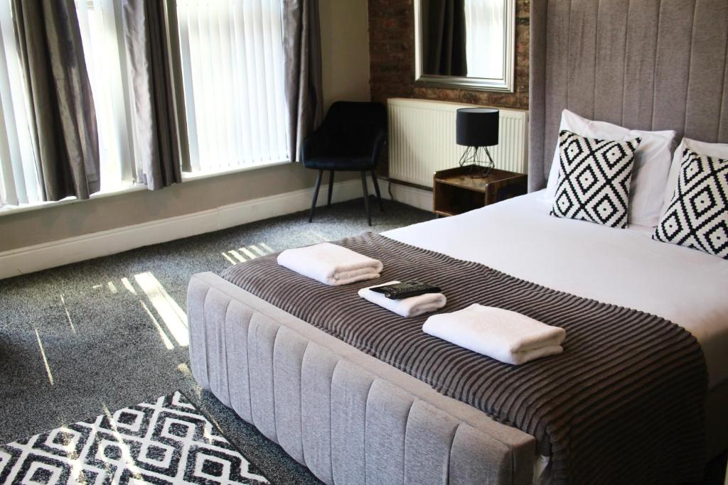 Postel nebo postele na pokoji v ubytování Mitre Hotel Manchester City Centre