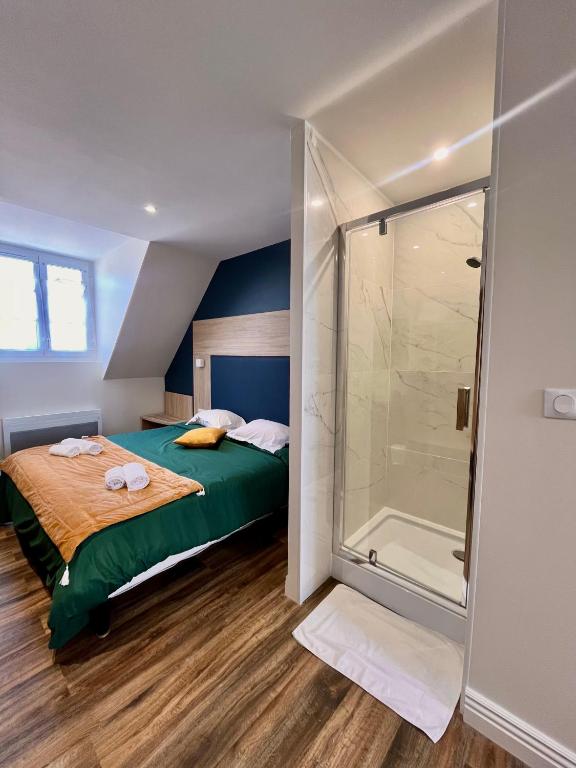 Postel nebo postele na pokoji v ubytování Armor Hotel