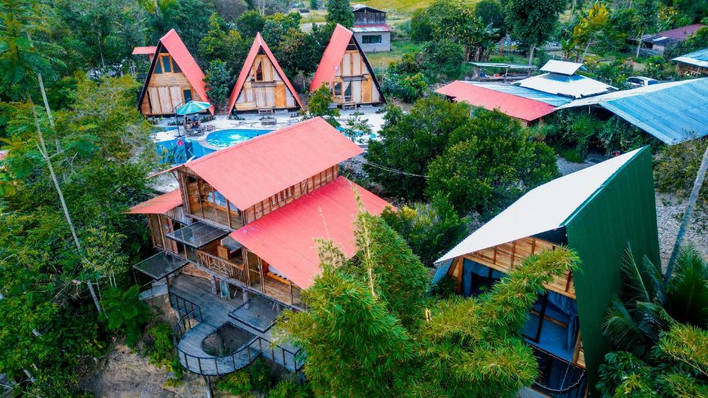 an overhead view of a resort with a swimming pool at RioVida EcoLodge in Nueva Tarqui
