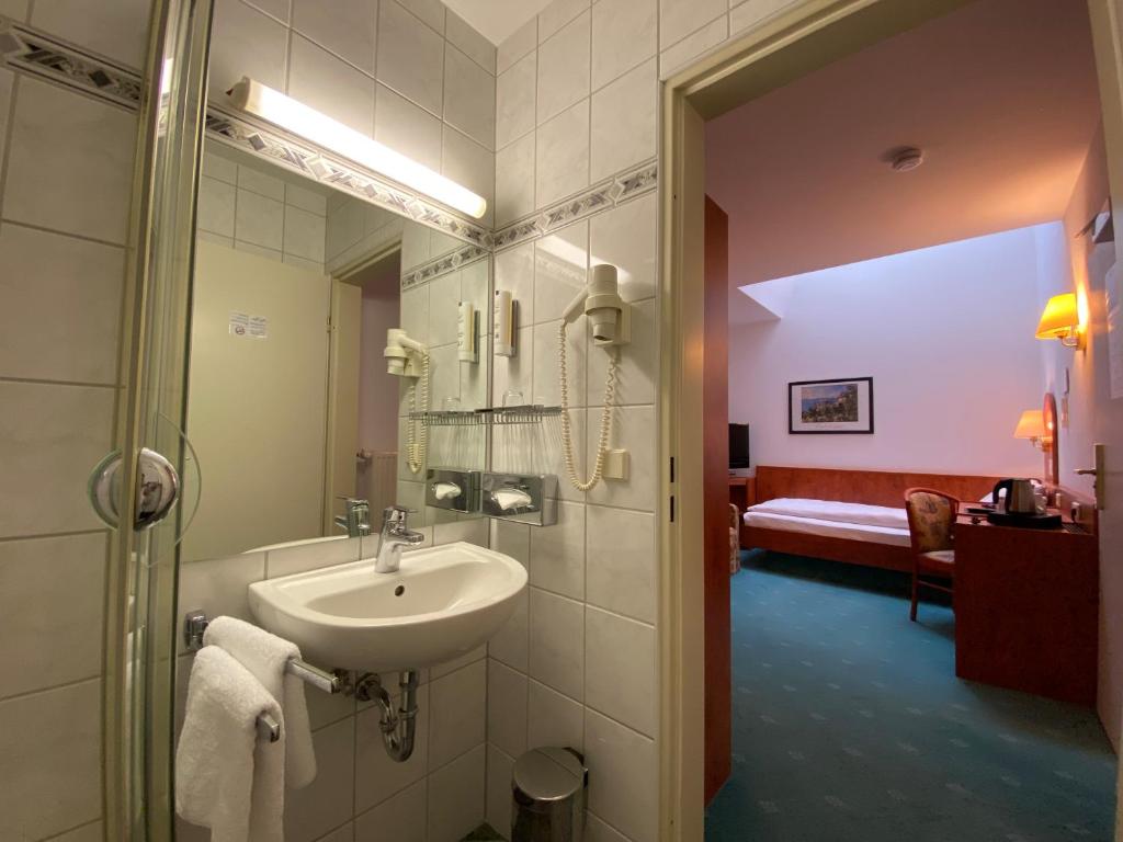 Koupelna v ubytování Hotel Hansa