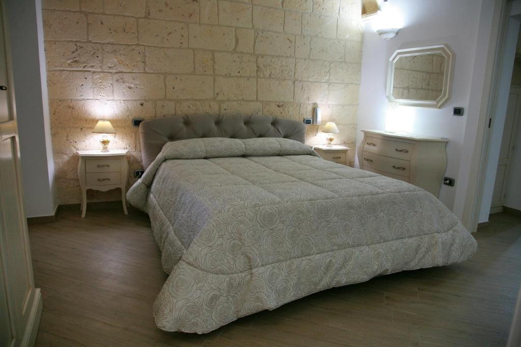 Кровать или кровати в номере L'Angolo del Salento