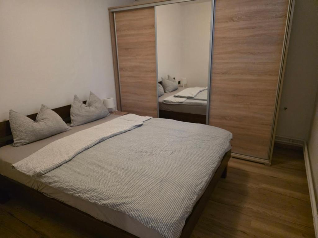 Posteľ alebo postele v izbe v ubytovaní Apartman Max