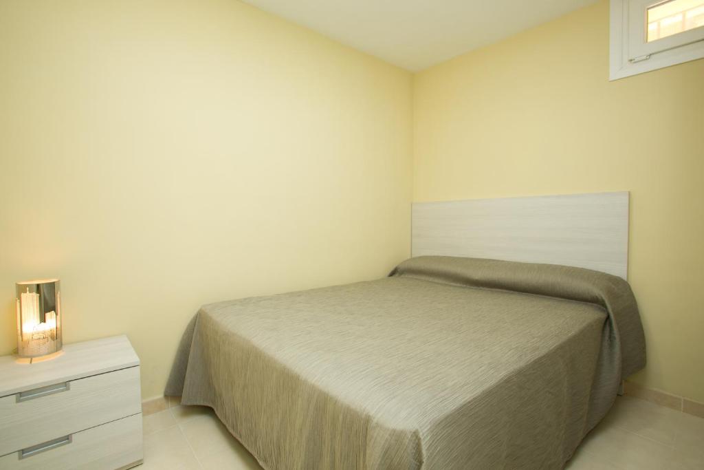 A bed or beds in a room at Villas Altos De Marbella