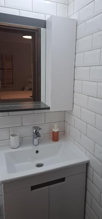 Koupelna v ubytování Sabor Residence