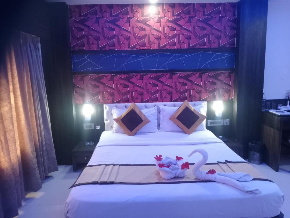 Postel nebo postele na pokoji v ubytování Hotel Durene