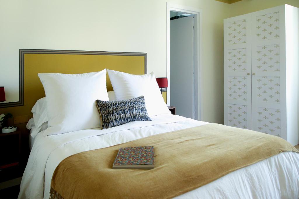 Ένα ή περισσότερα κρεβάτια σε δωμάτιο στο Flowers Rooms - Ponte Milvio