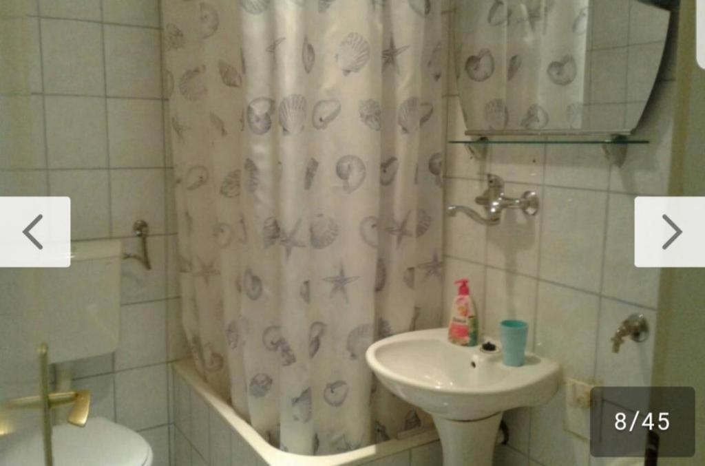 Vannituba majutusasutuses Apartmani i sobe Goca
