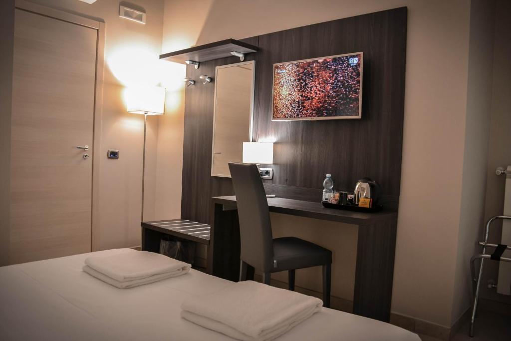 Posteľ alebo postele v izbe v ubytovaní Brain Rooms & Suite
