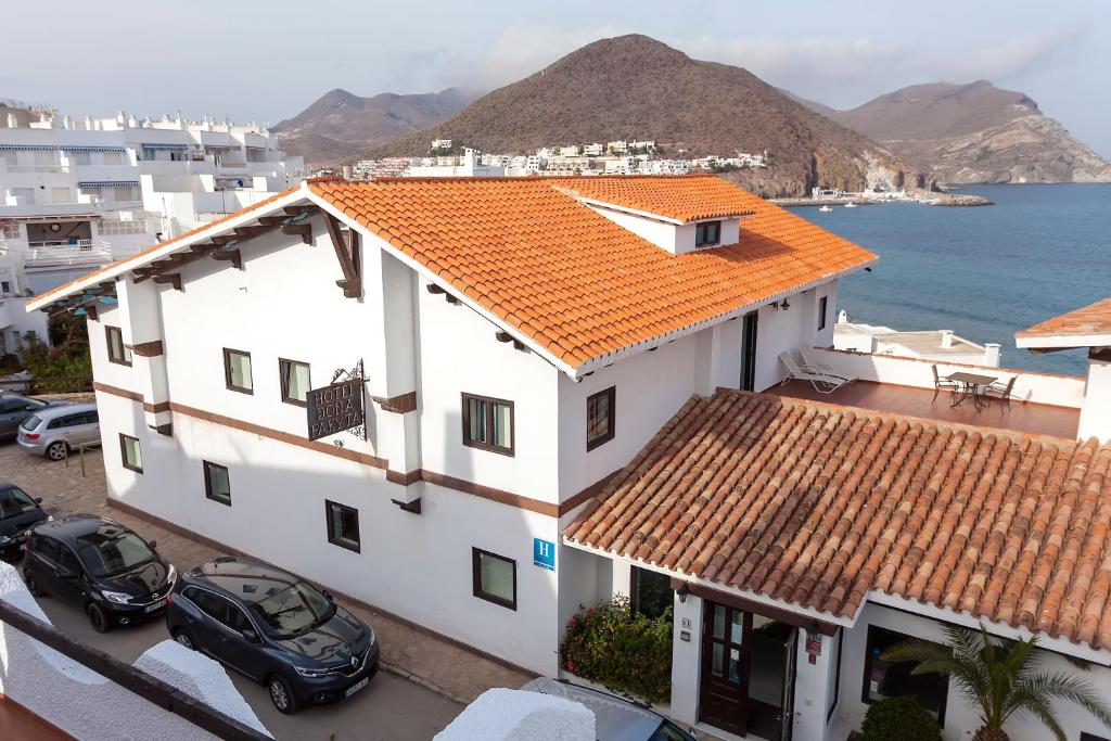 an aerial view of a white building with an orange roof at Doña Pakyta in San José