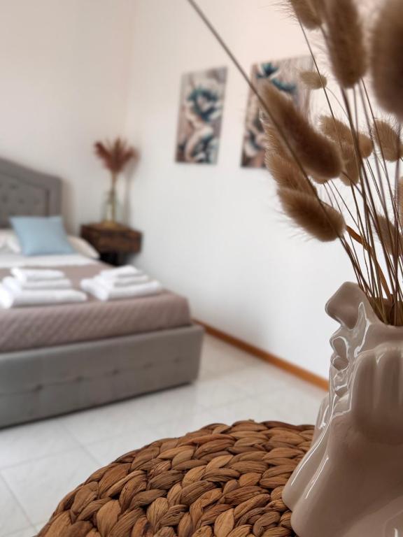 Postel nebo postele na pokoji v ubytování Garda Lake Holiday Apartments quadrilocale