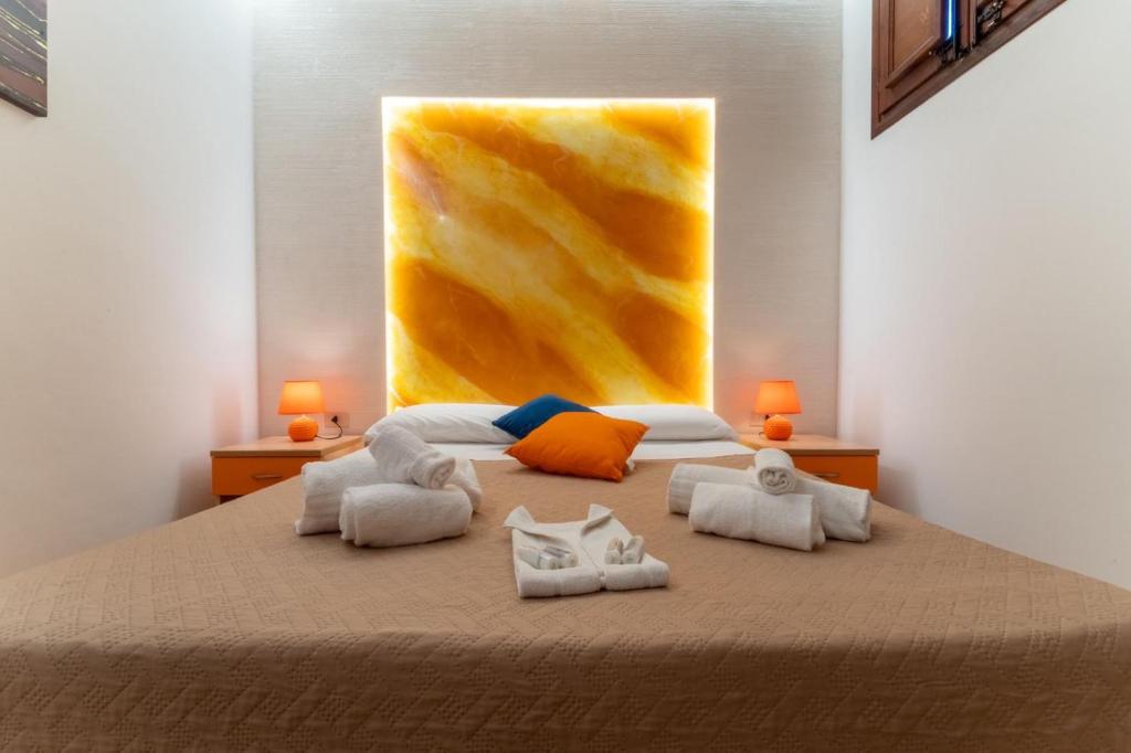 Postel nebo postele na pokoji v ubytování "L'Oasi di Favignana" Room and Charme