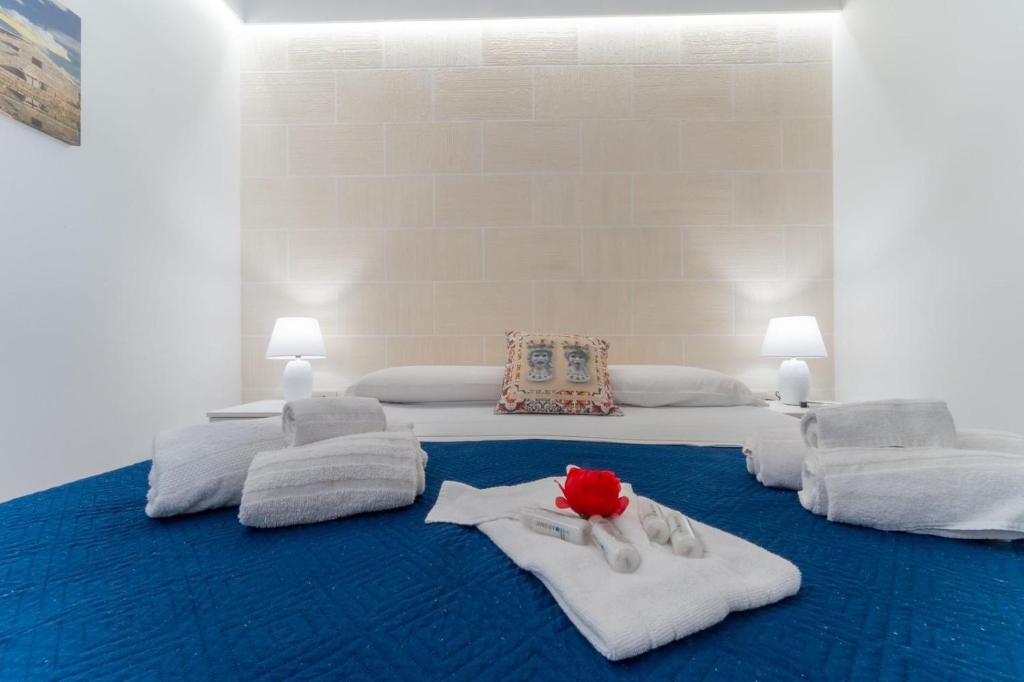 Postel nebo postele na pokoji v ubytování "L'Oasi di Favignana" Room and Charme