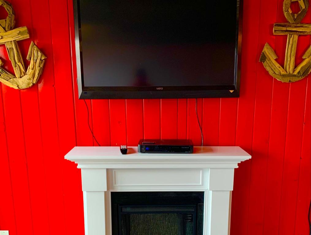 TV a/nebo společenská místnost v ubytování Oceanhouse