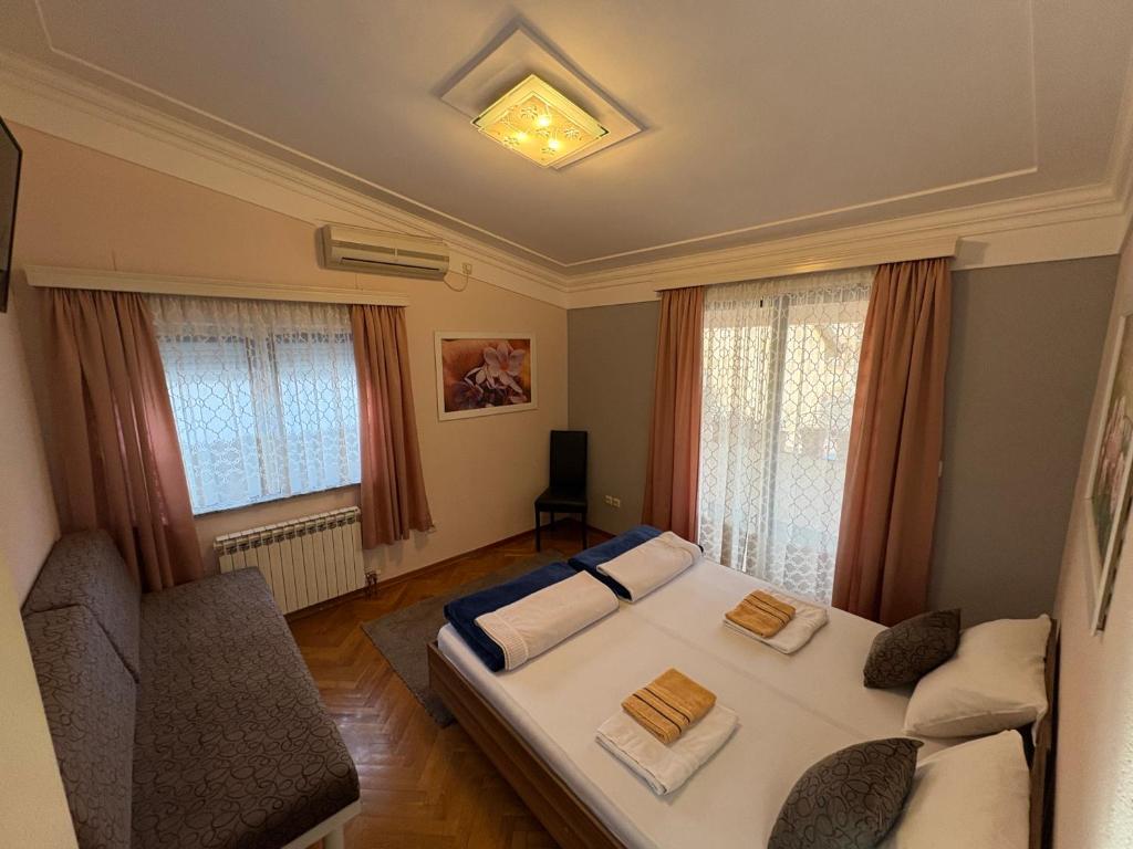 Postel nebo postele na pokoji v ubytování Hostel Dino
