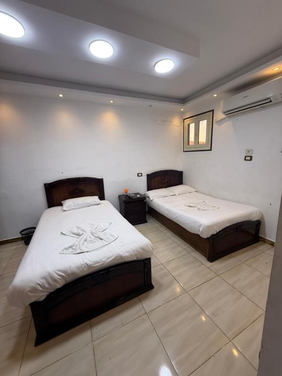 Letto o letti in una camera di Middle East pyramid view