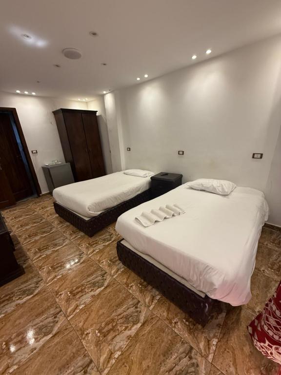 Letto o letti in una camera di Middle East pyramid view