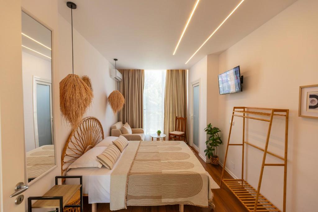 a bedroom with a large bed in a room at Villa Shafeti in Ksamil