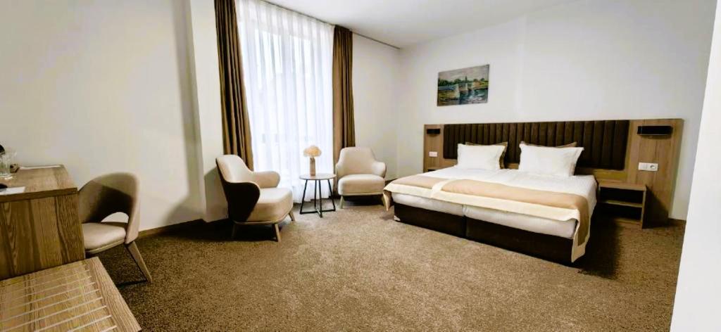Postel nebo postele na pokoji v ubytování Evelin Deluxe House