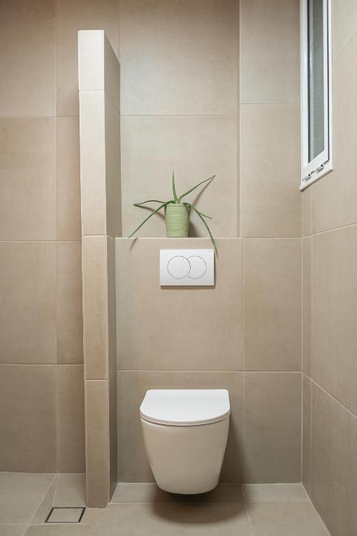 Koupelna v ubytování Hotel Akropol