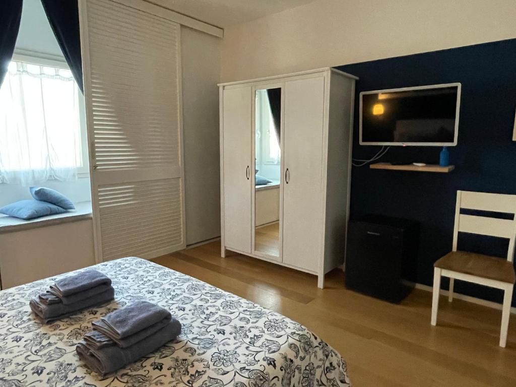 Postel nebo postele na pokoji v ubytování La Pecora Nera B&B