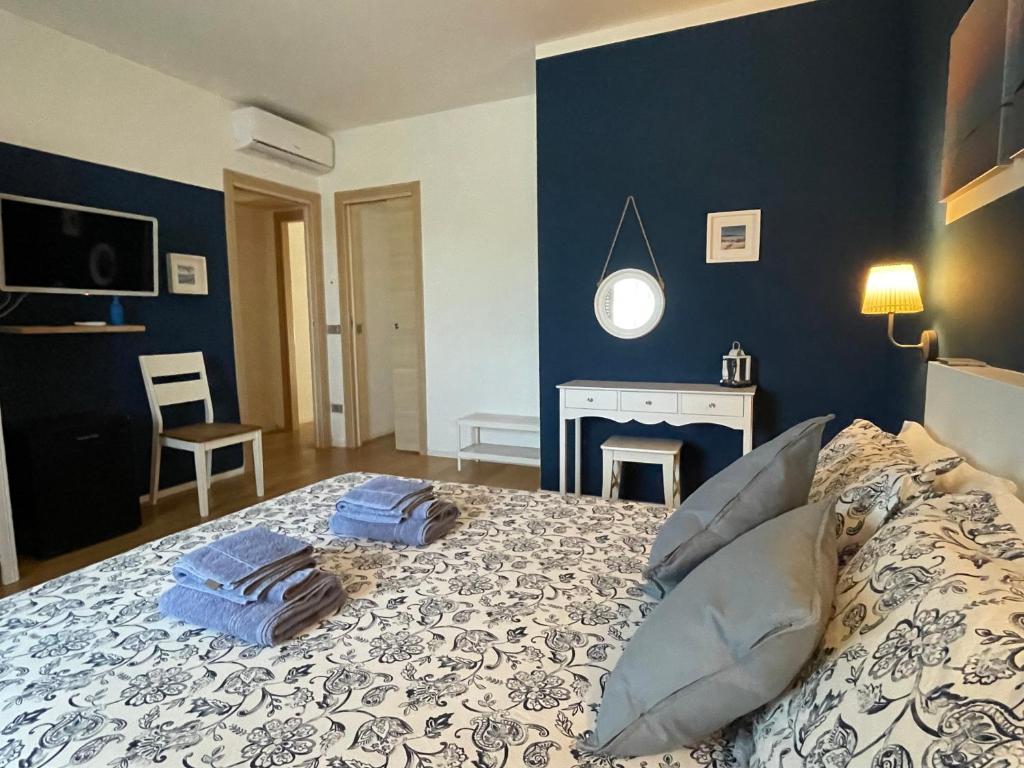 Postel nebo postele na pokoji v ubytování La Pecora Nera B&B