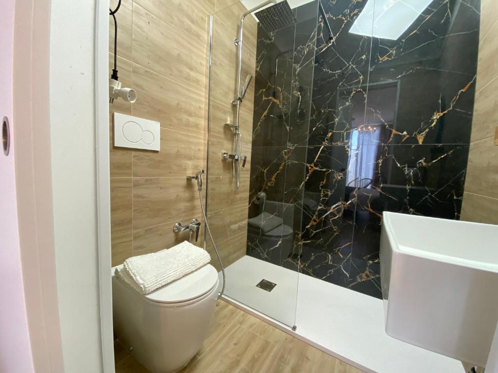 Koupelna v ubytování Isid'Oro Rooms