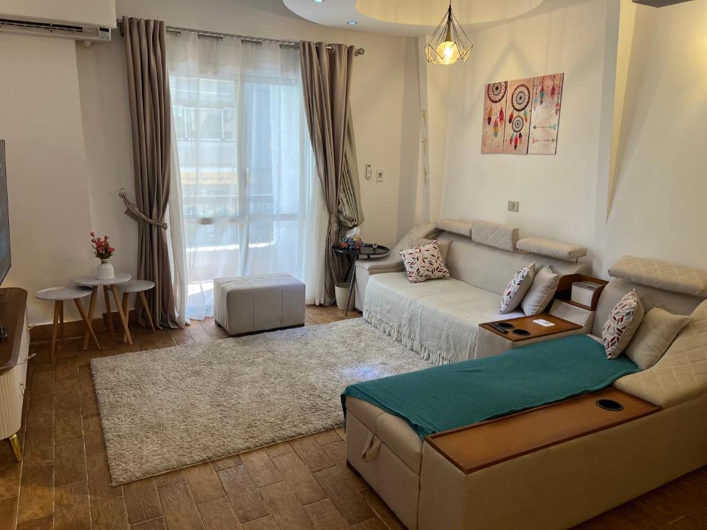 Posezení v ubytování Cozy Apartment