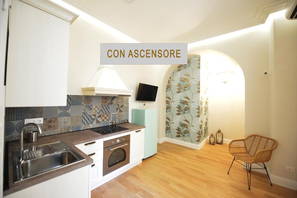 Kuchyň nebo kuchyňský kout v ubytování Domus D'Angelo B&B