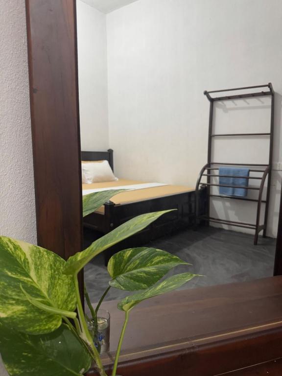 Postel nebo postele na pokoji v ubytování Rilu Relax villa Arugambay