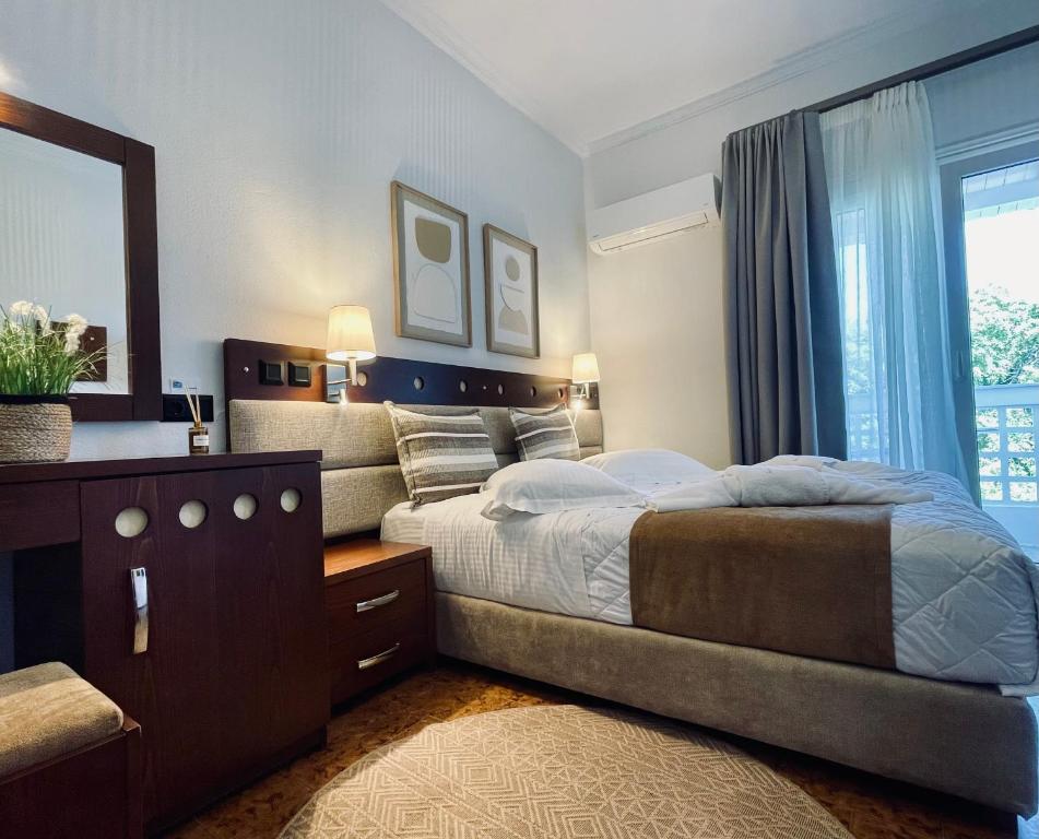 Postel nebo postele na pokoji v ubytování Semiramis Guesthouse