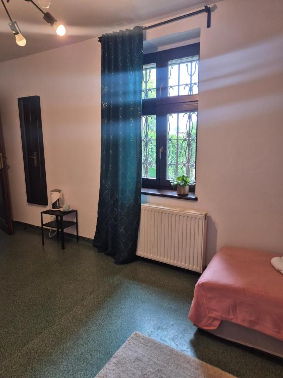 Postel nebo postele na pokoji v ubytování Hostel Dobranocka