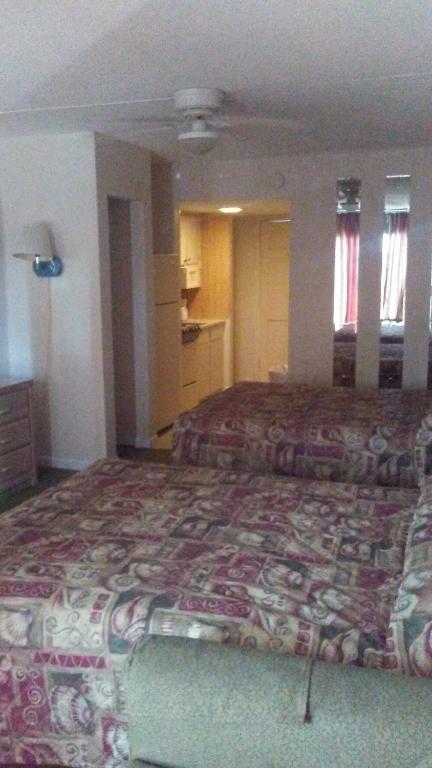 Ein Bett oder Betten in einem Zimmer der Unterkunft David&#39;s Landing