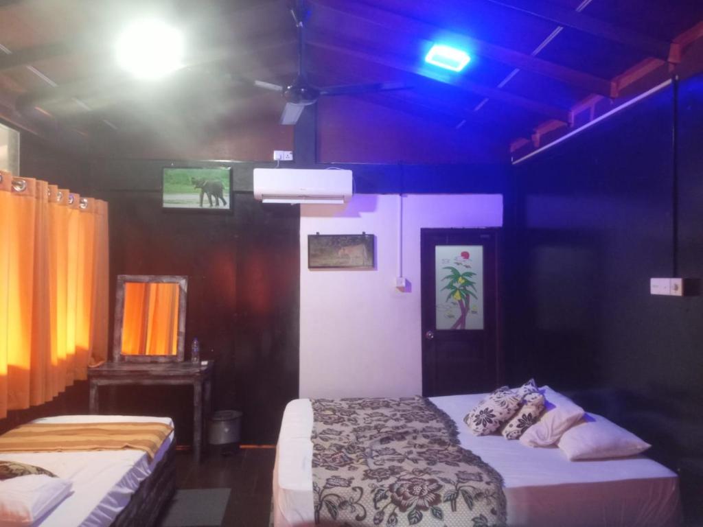 Postel nebo postele na pokoji v ubytování Ella Deck Villa