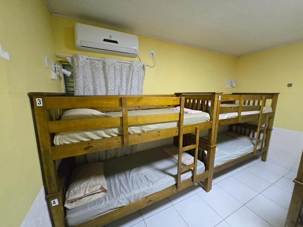 Postel nebo postele na pokoji v ubytování Pousada Hostel Mar e Sertão