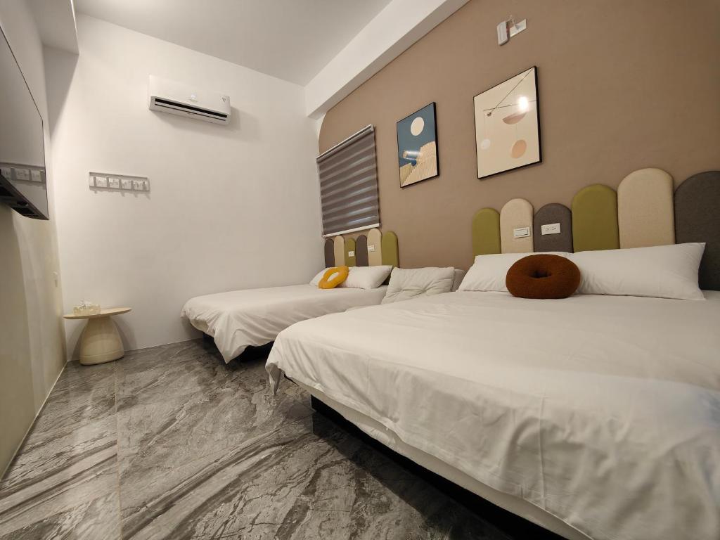 Postel nebo postele na pokoji v ubytování Space out homestay