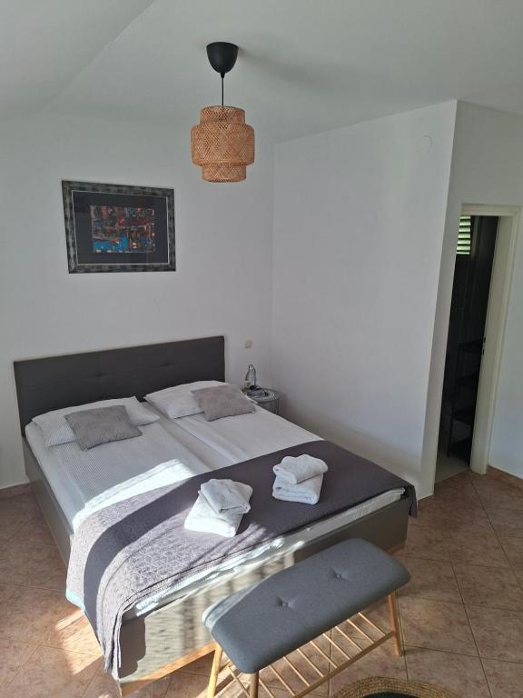 Postel nebo postele na pokoji v ubytování Martina Guest house