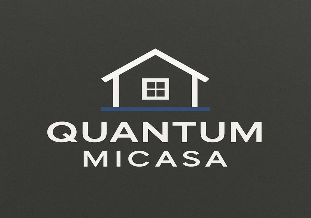a logo for a real estate company with a house at Quantum MiCasa in Muar