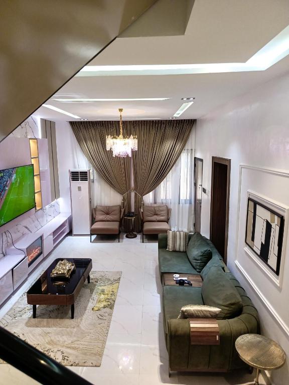 TV a/nebo společenská místnost v ubytování Vee Home