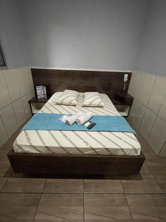 Postel nebo postele na pokoji v ubytování Hotel xandu-proximo arena corinthians