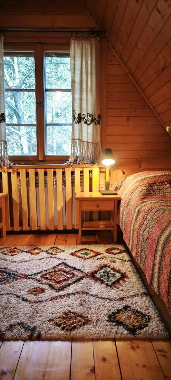 Posteľ alebo postele v izbe v ubytovaní Domek Raj Zakopane
