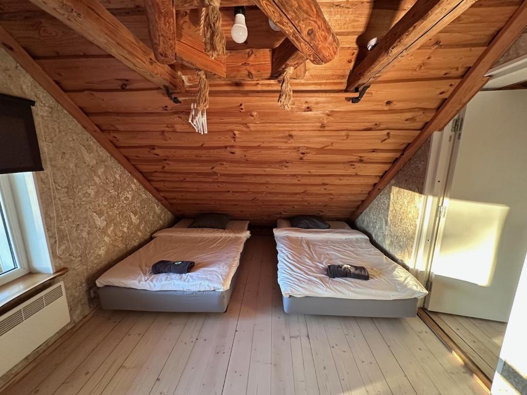 Postel nebo postele na pokoji v ubytování Kaldavere Tourism Farm