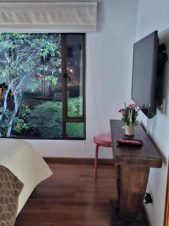 TV a/nebo společenská místnost v ubytování House Life
