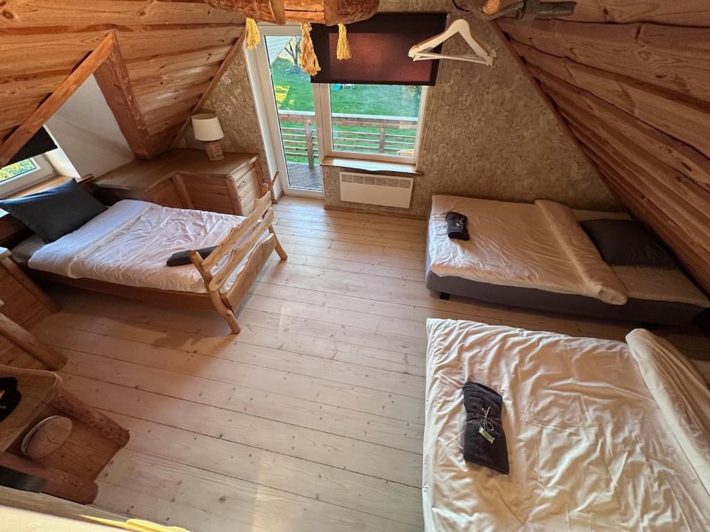 Postel nebo postele na pokoji v ubytování Kaldavere Tourism Farm